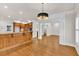 Open kitchen and living area with island and stainless steel appliances at 5844 Brookstone Nw Walk, Acworth, GA 30101