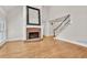 Spacious living room featuring a fireplace and a staircase at 5844 Brookstone Nw Walk, Acworth, GA 30101