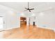 Spacious living room with hardwood floors, recessed lighting, and views into the kitchen at 5844 Brookstone Nw Walk, Acworth, GA 30101