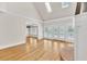 Bright living room with hardwood floors, skylights, and French doors to a patio at 5844 Brookstone Nw Walk, Acworth, GA 30101