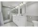 Modern bathroom featuring a walk-in shower, double vanity, and gray accents at 1 N Boundary Nw Pl, Atlanta, GA 30318