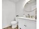 Bathroom boasts modern fixtures, marble countertop, and elegant mirror at 1 N Boundary Nw Pl, Atlanta, GA 30318