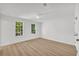 Spacious bedroom with two windows and ceiling fan at 1 N Boundary Nw Pl, Atlanta, GA 30318
