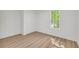 Bedroom with bright window and a spacious closet at 1 N Boundary Nw Pl, Atlanta, GA 30318