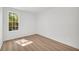 Bright bedroom with large window and neutral walls offers a serene retreat at 1 N Boundary Nw Pl, Atlanta, GA 30318