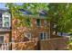 Brick townhouse with a partially enclosed patio at 1 N Boundary Nw Pl, Atlanta, GA 30318