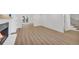 Open living space showcasing new floors and a fireplace at 1 N Boundary Nw Pl, Atlanta, GA 30318