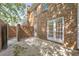 Private patio with brick surround offers an ideal outdoor retreat, accessible from the home's interior at 1 N Boundary Nw Pl, Atlanta, GA 30318
