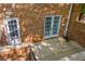 Private, fenced patio with brick surround at 1 N Boundary Nw Pl, Atlanta, GA 30318
