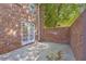 Spacious back patio with brick fencing at 1 N Boundary Nw Pl, Atlanta, GA 30318