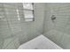 Modern shower with sleek tile, built-in niche, and elegant fixtures at 1 N Boundary Nw Pl, Atlanta, GA 30318
