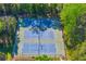 Aerial shot featuring the community's well-maintained tennis courts at 1 N Boundary Nw Pl, Atlanta, GA 30318