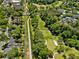 Aerial view showcasing the golf course and lush greenery surrounding the well-maintained property at 2067 Telfair Circle # A&B, Atlanta, GA 30324