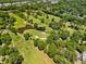 Scenic aerial shot of golf course with ponds and abundant trees surrounding the beautiful property at 2067 Telfair Circle # A&B, Atlanta, GA 30324