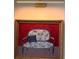 Detailed view of a framed piece of art with an ornate frame and bright overhead lighting at 2067 Telfair Circle # A&B, Atlanta, GA 30324