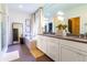 Bright bathroom featuring a double sink vanity, a soaking tub, and modern finishes at 2067 Telfair Circle # A&B, Atlanta, GA 30324