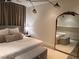 Cozy bedroom with neutral tones and elegant full length mirror at 2067 Telfair Circle # A&B, Atlanta, GA 30324