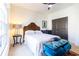 Cozy bedroom features a wood headboard, neutral walls, and bright natural light from a large window at 2067 Telfair Circle # A&B, Atlanta, GA 30324