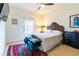 Comfortable bedroom with a unique headboard, colorful rug, and ample natural light at 2067 Telfair Circle # A&B, Atlanta, GA 30324