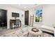 Bonus room featuring a desk, large window, stylish carpet, and a comfortable couch at 2067 Telfair Circle # A&B, Atlanta, GA 30324