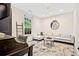 Bonus room features a large window, stylish carpet, and a comfortable couch at 2067 Telfair Circle # A&B, Atlanta, GA 30324