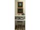 Decorated bookshelf nook with artwork, books, and pottery at 2067 Telfair Circle # A&B, Atlanta, GA 30324