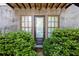 Charming front entrance framed by lush greenery and featuring a stylish door at 2067 Telfair Circle # A&B, Atlanta, GA 30324