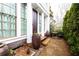 Charming front porch with decorative planters and seating area, offering a welcoming entrance to the home at 2067 Telfair Circle # A&B, Atlanta, GA 30324