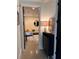 Hallway view showing entry to the living room with stylish decor and sleek furnishings at 2067 Telfair Circle # A&B, Atlanta, GA 30324
