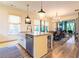 Open kitchen with a central island, stainless steel appliances, and a connected dining area at 2067 Telfair Circle # A&B, Atlanta, GA 30324