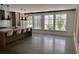 Open-concept kitchen and dining area with ample natural light and concrete flooring at 2067 Telfair Circle # A&B, Atlanta, GA 30324