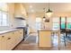 Bright kitchen featuring white cabinets, stainless steel appliances, and a center island at 2067 Telfair Circle # A&B, Atlanta, GA 30324
