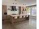 Modern kitchen featuring a large island, barstool seating, stainless steel appliances, and an abundance of natural light at 2067 Telfair Circle # A&B, Atlanta, GA 30324