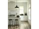 Well-lit kitchen showcasing white cabinetry, quartz countertops, and subway tile backsplash at 2067 Telfair Circle # A&B, Atlanta, GA 30324