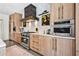 Modern kitchen with stainless steel appliances, custom cabinetry, and stylish accents at 2067 Telfair Circle # A&B, Atlanta, GA 30324