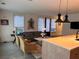 Open-concept living space featuring a kitchen island, cozy seating, and stylish decor, creating a welcoming atmosphere at 2067 Telfair Circle # A&B, Atlanta, GA 30324