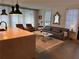 Cozy living room with vintage chairs, neutral sofa and island with pendants at 2067 Telfair Circle # A&B, Atlanta, GA 30324