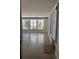 Bright living room featuring polished concrete floors and natural light from large windows at 2067 Telfair Circle # A&B, Atlanta, GA 30324
