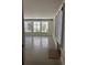 Spacious living area with concrete floors, lots of natural light, and access to outdoor space at 2067 Telfair Circle # A&B, Atlanta, GA 30324