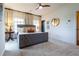 Relaxing main bedroom featuring a gray upholstered bed, neutral walls, and natural light at 2067 Telfair Circle # A&B, Atlanta, GA 30324