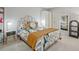 Cozy bedroom features a stylish bed frame, soft lighting, and modern decor at 212 Abingdon Way, Atlanta, GA 30328