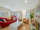 Spacious open-concept living room with fireplace, seating area, and natural light at 212 Abingdon Way, Atlanta, GA 30328