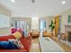 Spacious living room, featuring modern furniture, open floor plan and plenty of light at 212 Abingdon Way, Atlanta, GA 30328