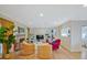 Bright living room with fireplace and modern decor, seamless flow, and plenty of light at 212 Abingdon Way, Atlanta, GA 30328