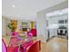 Open-concept dining and living area flowing seamlessly from a modern kitchen, ideal for entertaining and Gathering living at 212 Abingdon Way, Atlanta, GA 30328