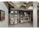 Well-organized basement storage area with shelving units and ample space for storing household items at 414 E Wesley Ne Rd, Atlanta, GA 30305