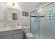 Elegant bathroom with a glass-enclosed shower, modern fixtures, and stylish vanity at 414 E Wesley Ne Rd, Atlanta, GA 30305
