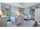 Charming bedroom featuring twin beds, natural light, and neutral-toned decor at 414 E Wesley Ne Rd, Atlanta, GA 30305