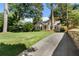 Beautiful home with a well-manicured lawn and a long driveway, exuding curb appeal and inviting charm at 414 E Wesley Ne Rd, Atlanta, GA 30305