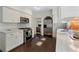 Gourmet kitchen boasting stainless steel appliances, white cabinets, and ample countertop space at 414 E Wesley Ne Rd, Atlanta, GA 30305